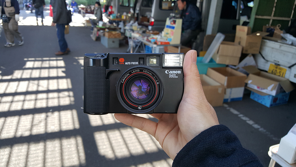 Buying cameras at a flea market
