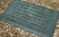The plaque above the location where the car was buried.