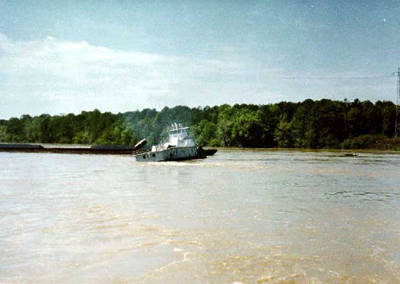 The pilot revs the engine and engine exhaust can be seen